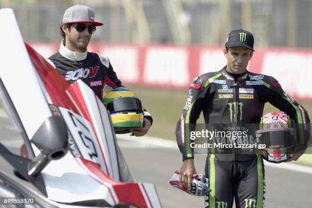 Johann Zarco of France and Monster Yamaha Tech 3 and Bruno Senna of Brasile pose during the pre-event "A race between a Yamaha M1 and a McLaren GT3"...