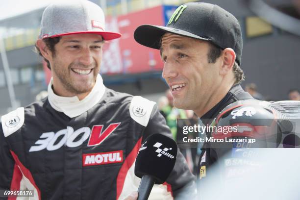 Johann Zarco of France and Monster Yamaha Tech 3 speaks with journalists durin the pre-event "A race between a Yamaha M1 and a McLaren GT3" during...