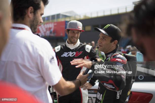 Johann Zarco of France and Monster Yamaha Tech 3 speaks with journalists durin the pre-event "A race between a Yamaha M1 and a McLaren GT3" during...