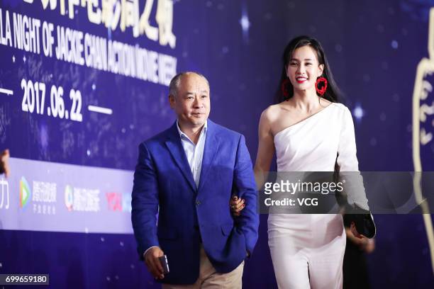Retired gymnast and entrepreneur Li Ning, yoga model and actress Miya Muqi arrive at the red carpet of Gala Night of Jackie Chan Action Movie Week...