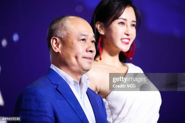 Retired gymnast and entrepreneur Li Ning, yoga model and actress Miya Muqi arrive at the red carpet of Gala Night of Jackie Chan Action Movie Week...