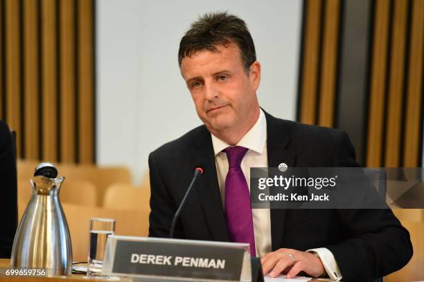 Her Majesty's Inspector of Constabulary in Scotland, Derek Penman, gives evidence to the Scottish Parliament's Justice Sub-committee on Policing,...