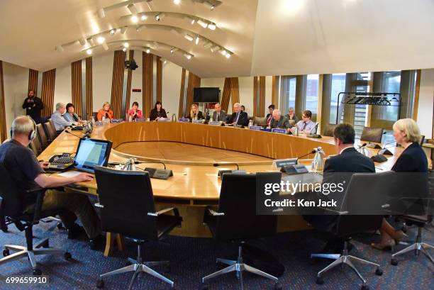 Her Majesty's Inspector of Constabulary in Scotland, Derek Penman , gives evidence to the Scottish Parliament's Justice Sub-committee on Policing,...