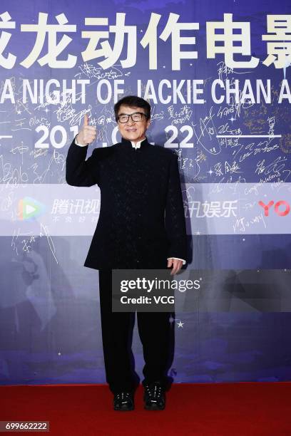 Actor Jackie Chan arrives at the red carpet of Gala Night of Jackie Chan Action Movie Week during the 20th Shanghai International Film Festival on...