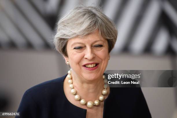 British Prime Minister Theresa May arrives at the EU Council headquarters ahead of a European Council meeting on June 22, 2017 in Brussels, Belgium....