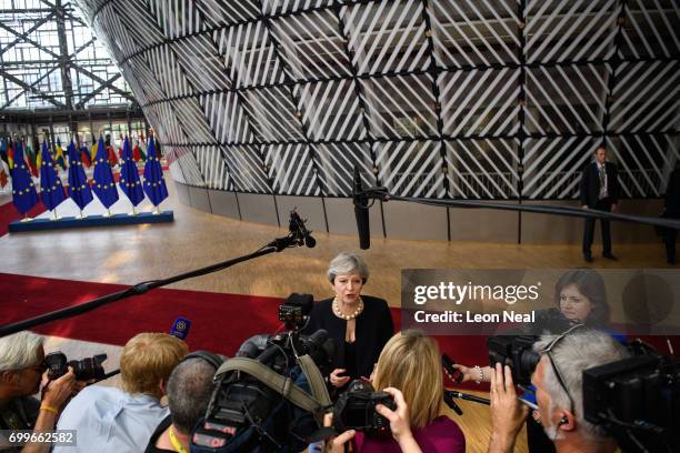 British Prime Minister Theresa May arrives at the EU Council headquarters ahead of a European Council meeting on June 22, 2017 in Brussels, Belgium....