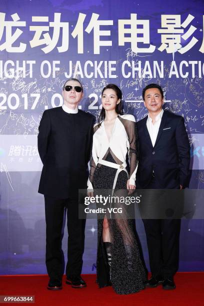 Director Feng Xiaogang, actress Elane Zhong Chuxi, film producer and Huayi Brothers CEO Wang Zhonglei arrive at the red carpet of Gala Night of...