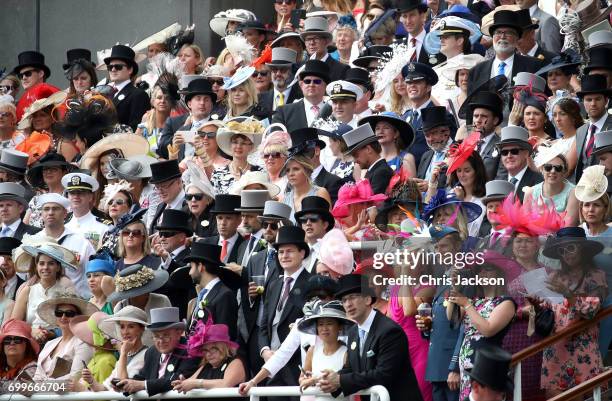 Crowd looking into the Royal Procession arriving into the Parade Ring during Royal Ascot 2017 at Ascot Racecourse on June 22, 2017 in Ascot, England.