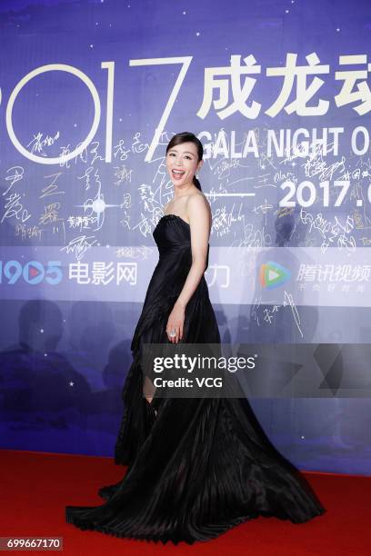 Actress Zhang Jingchu arrives at the red carpet of Gala Night of Jackie Chan Action Movie Week during the 20th Shanghai International Film Festival...