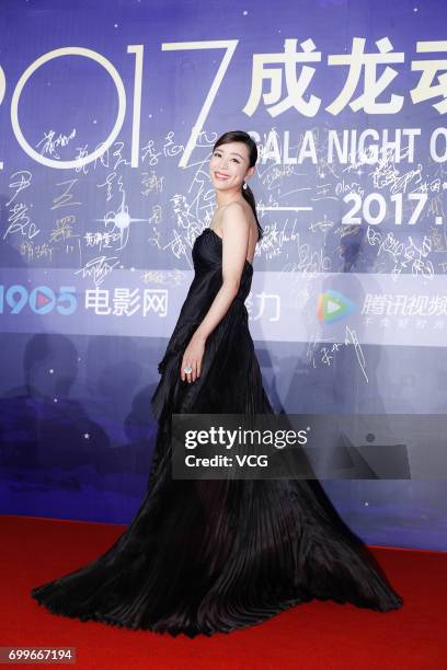 Actress Zhang Jingchu arrives at the red carpet of Gala Night of Jackie Chan Action Movie Week during the 20th Shanghai International Film Festival...