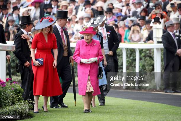 John Warren, Princess Eugenie of York, Prince Andrew, Duke of York, Queen Elizabeth II and Princess Beatrice of York are seen in the Parade Ring as...