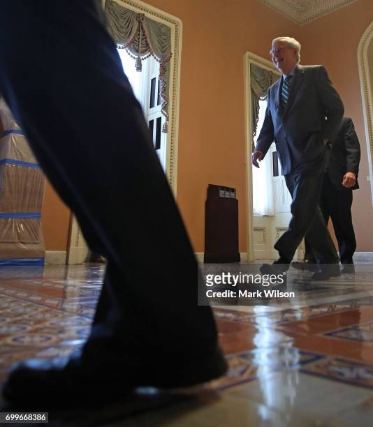 Senate Majority Leader Mitch McConnell walks to his office on Capitol Hill on June 22, 2017 in Washington, DC. This morning Senate GOP lawmakers are...