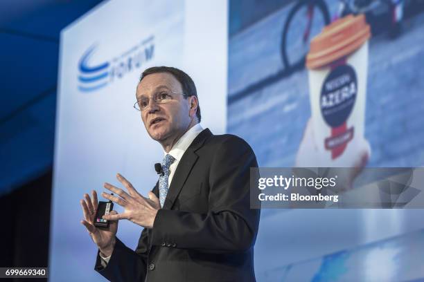 Mark Schneider, chief executive officer of Nestle SA, gestures as he speaks during a panel session at the 61st Global Summit of the Consumer Goods...