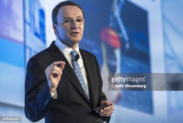 Mark Schneider, chief executive officer of Nestle SA, gestures as he speaks during a panel session at the 61st Global Summit of the Consumer Goods...
