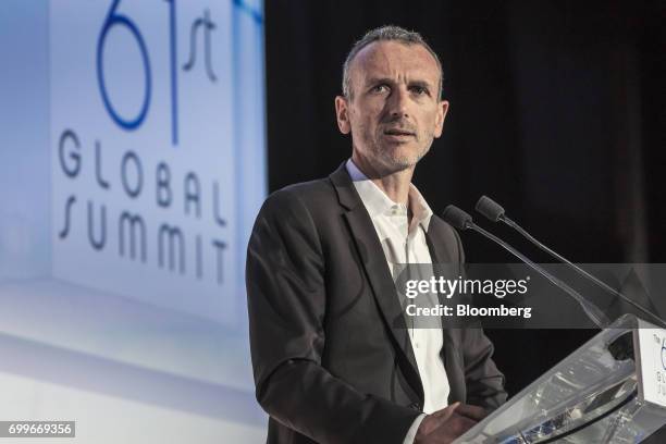 Emmanuel Faber, chief executive officer of Danone SA, speaks during a panel session at the 61st Global Summit of the Consumer Goods Forum in Berlin,...