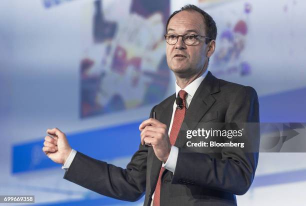 Mike Coupe, chief executive officer of J Sainsbury Plc, gestures as he speaks during a panel session at the 61st Global Summit of the Consumer Goods...