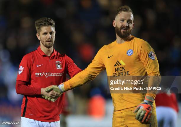 Coventry City's Martin Lorentzson shows his dejection as he shake hand of Peterborough United's Ben Alnwick