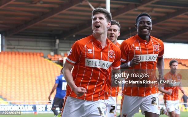 Blackpool's Danny Philliskirk celebrates scoring his side's first goal against Bury