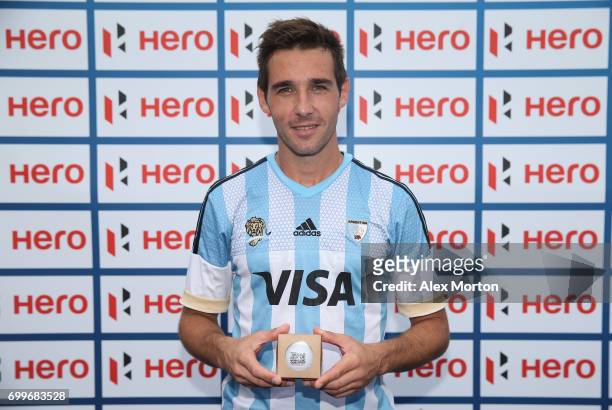 Matias Paredes of Argentina with his milestone award commemorating 300 caps for Argentina after the quarter final match between Argentina and...