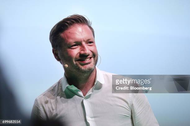 Rolf Schromgens, chief executive officer of Trivago N.V., reacts during the Noah technology conference in Berlin, Germany, on Thursday, June 22,...