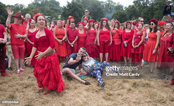 The Shakti Sings choir perform at the Stone Circle at the Glastonbury Festival at Worthy Farm in Pilton on June 22, 2017 near Glastonbury, England....