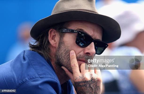 David Beckham watches on during the mens singles second round match between Jordan Thompson of Australia and Sam Querry of The United States on day...