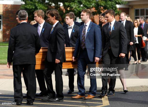 The casket of Otto Warmbier is carried out from his funeral at Wyoming High School June 22, 2017 in Wyoming, Ohio. Otto Warmbier, the 22-year-old...