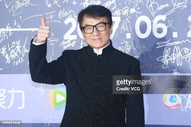 Actor Jackie Chan arrives at the red carpet of Gala Night of Jackie Chan Action Movie Week during the 20th Shanghai International Film Festival on...