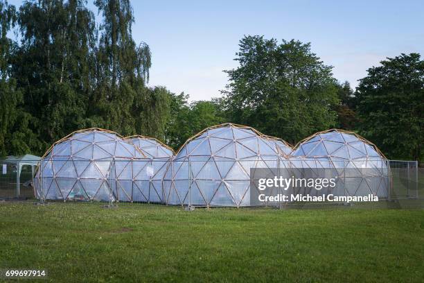 View of the "Pollution Pods" an art exhibit created by Michael Pinsky for the 2017 Starmus Festival. The exhibit consists of six pods that simulate...