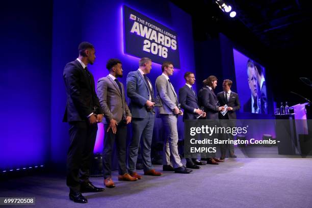 Burnley's Andre Gray, Swindon Town's Nicky Ajose, award presenter Football Manager Head of Strategic Business Development Tom Markham, Northampton...