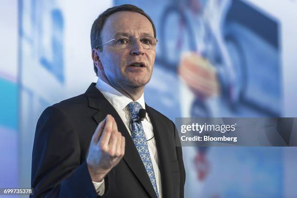 Mark Schneider, chief executive officer of Nestle SA, gestures as he speaks during a panel session at the 61st Global Summit of the Consumer Goods...