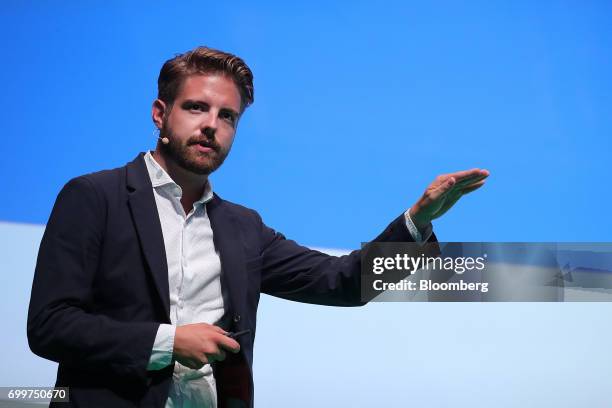 Peter Smith, chief executive officer of Blockchain Ltd., gestures as he speaks during the Noah technology conference in Berlin, Germany, on Thursday,...