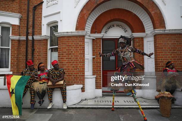 Performers wait as a memorial honoring the two million African and Caribbean military servicemen and women who served in World War I and World War...