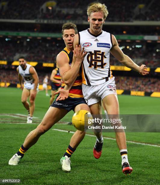 Will Langford of the hawks competes for the ball during the round 14 AFL match between the Adelaide Crows and the Hawthorn Hawks at Adelaide Oval on...