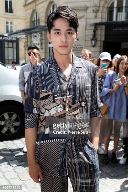 Xu Weizhou arrives at the Louis Vuitton show during the Paris Fashion Week - Menswear Spring/Summer 2018 on June 22, 2017 in Paris, France.