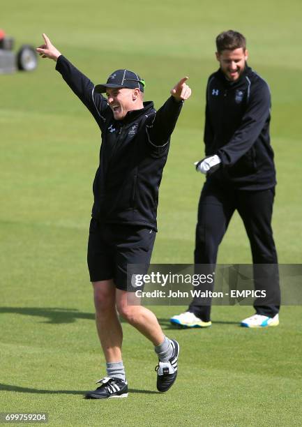 Surrey's Jason Roy and Steven Davies during the warm up