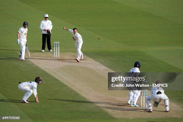 Surrey's Zafar Ansari bowls to Durham's Ryan Pringle