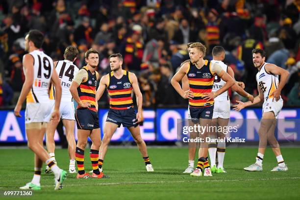 Crows players look on dejected after the final siren during the round 14 AFL match between the Adelaide Crows and the Hawthorn Hawks at Adelaide Oval...