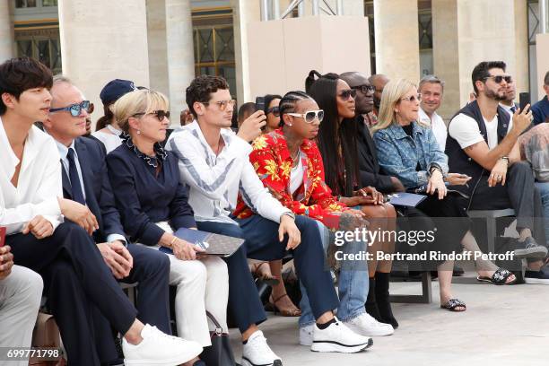 Gong Yoo, Chief Executive Officer of Louis Vuitton, Michael Burke, his wife Brigitte Burke, Jeremie Laheurte, Tyga and Naomi Campbell attend the...