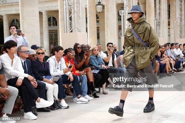 Gong Yoo, Chief Executive Officer of Louis Vuitton, Michael Burke, his wife Brigitte Burke, Jeremie Laheurte, Tyga and Naomi Campbell attend the...