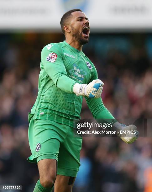 Millwall goalkeeper Jordan Archer celebrates after their first goal is scored by team-mate Lee Gregory