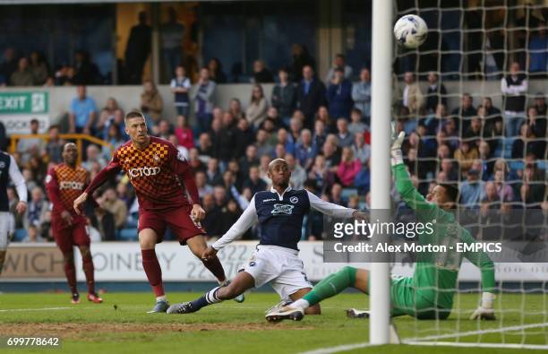 Millwall's Jamie Proctor scores his sides first goal of the match