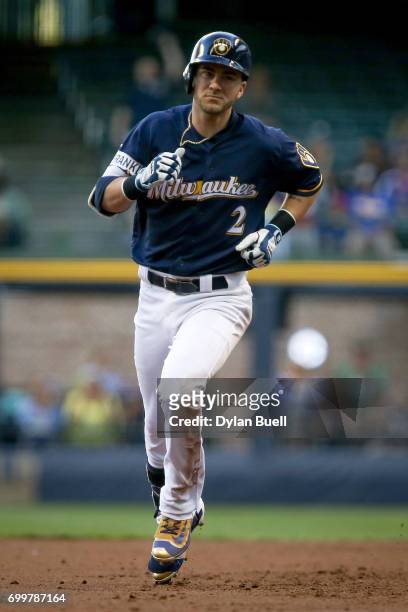 Nick Franklin of the Milwaukee Brewers rounds the bases after hitting a home run in the second inning against the Pittsburgh Pirates at Miller Park...