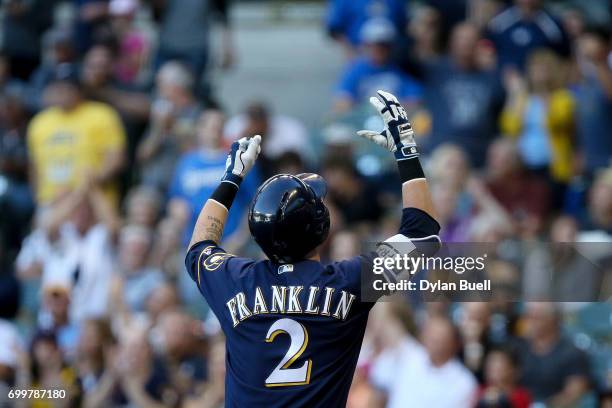 Nick Franklin of the Milwaukee Brewers celebrates after hitting a home run in the second inning against the Pittsburgh Pirates at Miller Park on June...