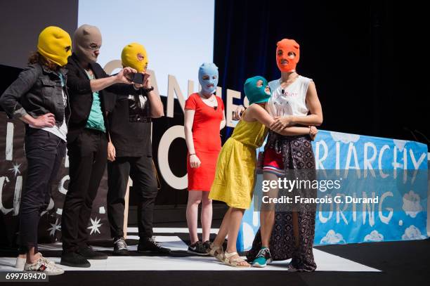 Masked member of protest band Pussy Riot , Pussy Riot performer Nadya Tolokonnikova and her daughter Gera Verzilova attend the Cannes Lions Festival...