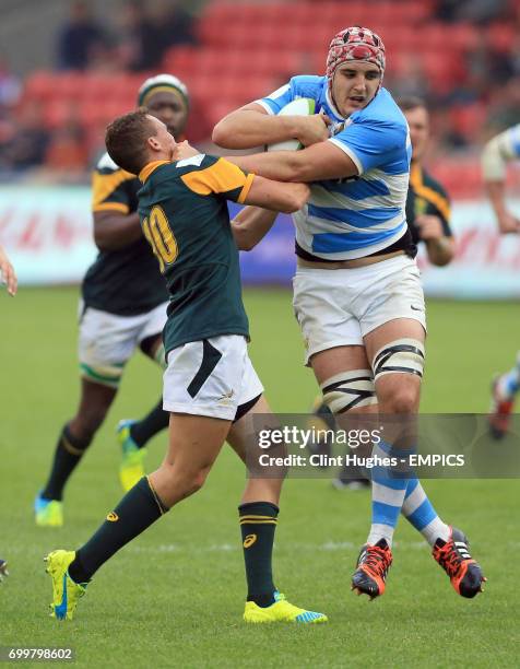 South Africa's Curwin Bosch tackles Argentina's Franco Molina during the Under 20's Rugby Union World Cup match at the AJ Bell Stadium, Salford.