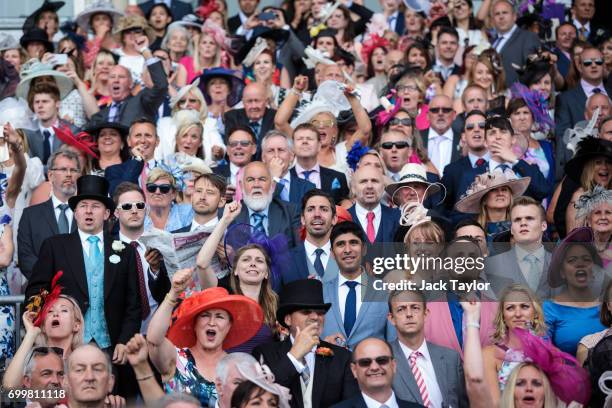 Racegoers react as they watch a race at Royal Ascot at Ascot Racecourse on June 22, 2017 in Ascot, England. The five-day Royal Ascot meeting is one...