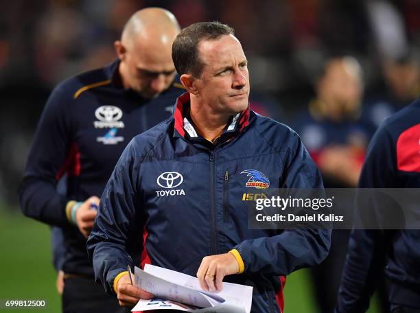 Adelaide Crows Senior Coach Don Pyke walks from the field at half time during the round 14 AFL match between the Adelaide Crows and the Hawthorn...