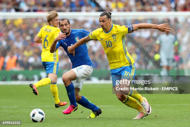 Sweden's Zlatan Ibrahimovic and Italy's Giorgio Chiellini battle for the ball
