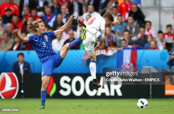Croatia's Ivan Strinic and Czech Republic's Josef Sural battle for the ball